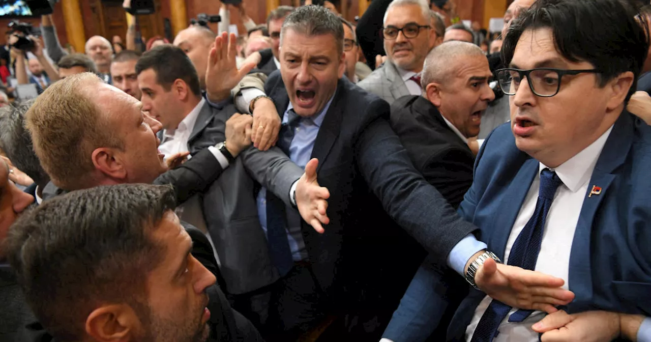 Lawmakers brawl in Serbia parliament amid accusations over train station roof collapse that killed 15 people