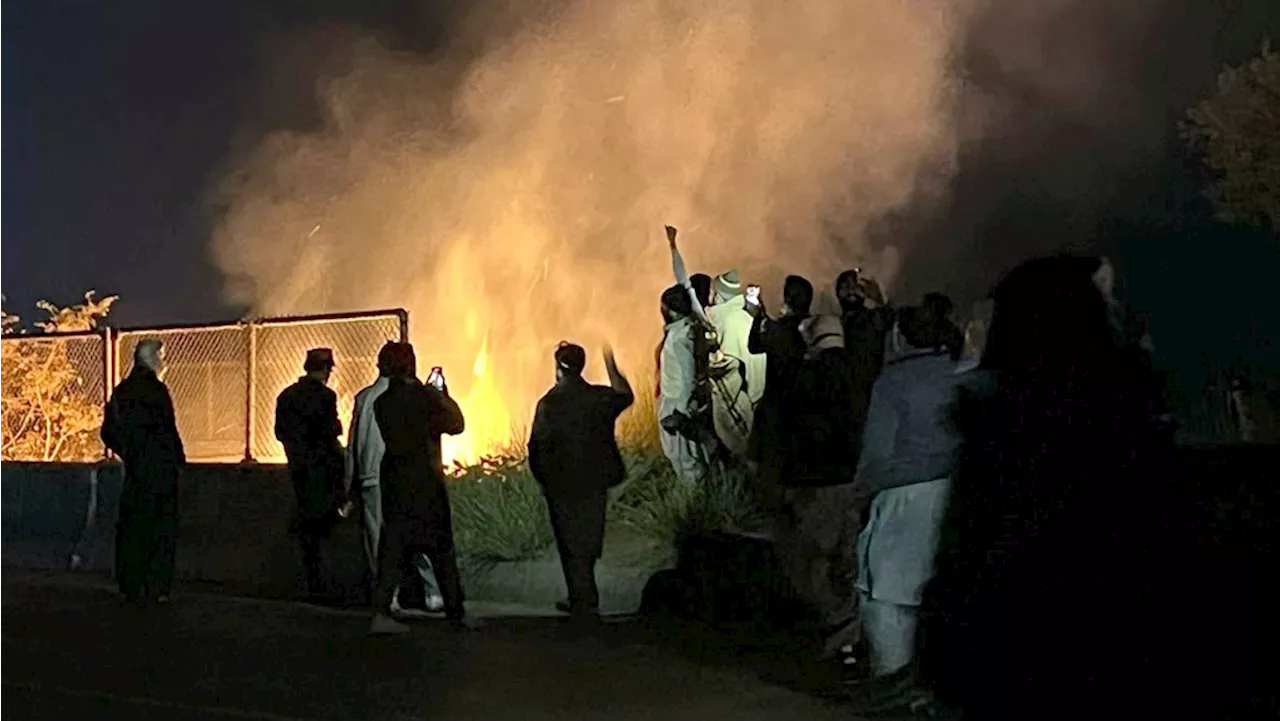 Police fire tear gas as thousands supporting former prime minister Khan arrive near capital