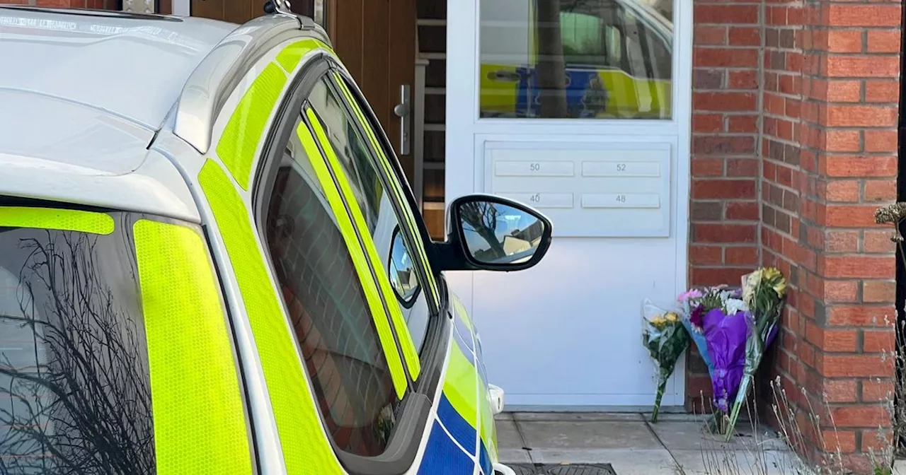 Floral tributes laid in memory of woman found dead in Crosby