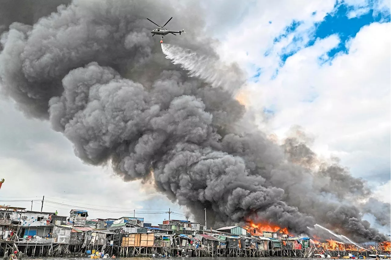 Inferno rips through Manila slums