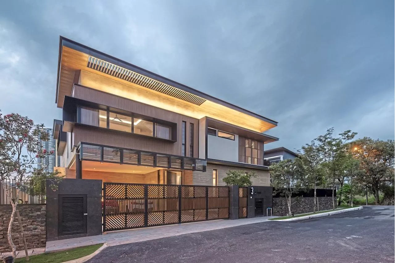 Malaysian 2-storey bungalow in Puchong designed around a courtyard and fish pond