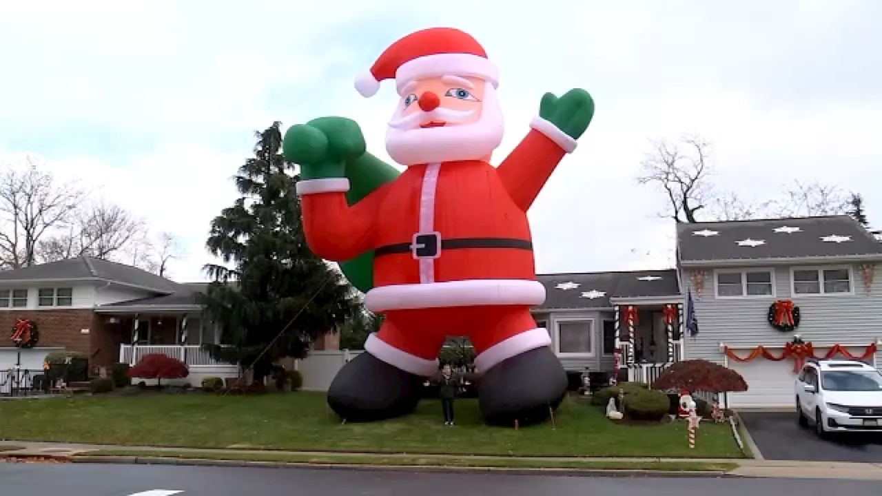 Homeowner's enormous inflatable Santa Claus brings extra holiday spirit to Farmingdale residents