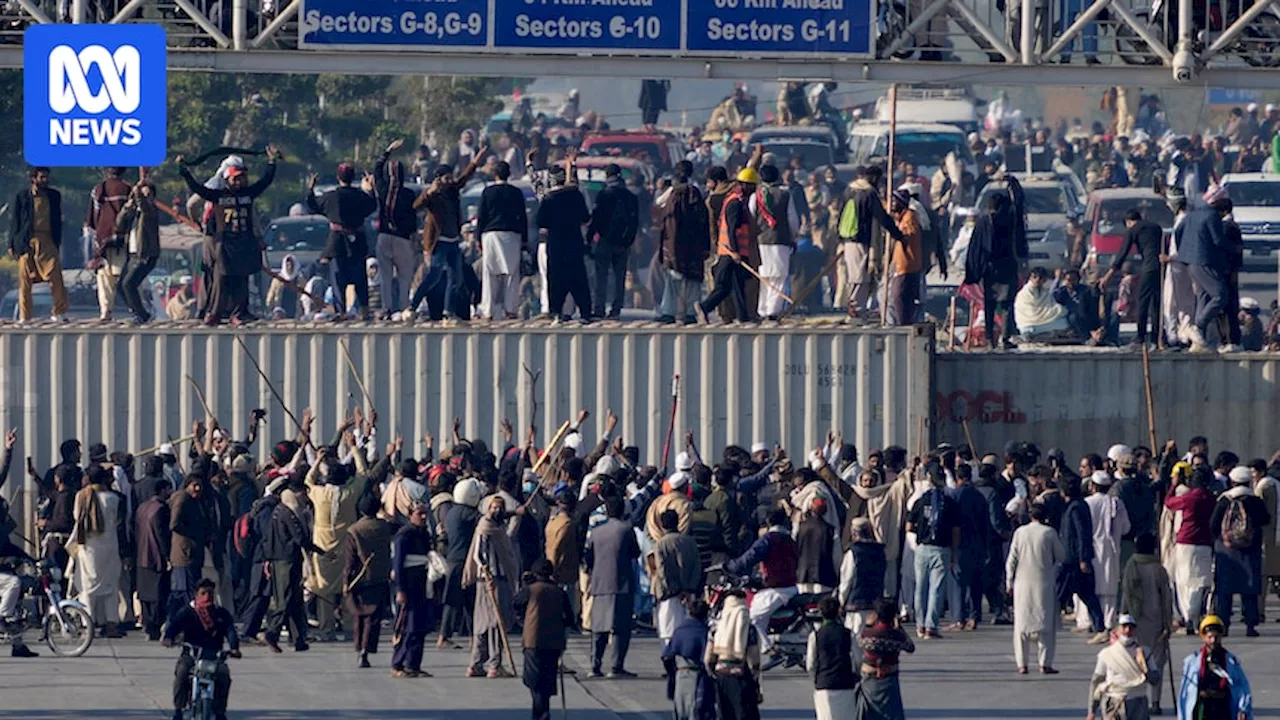 Pakistani government deploys army to ward off Imran Khan protesters as deadly unrest grips Islamabad