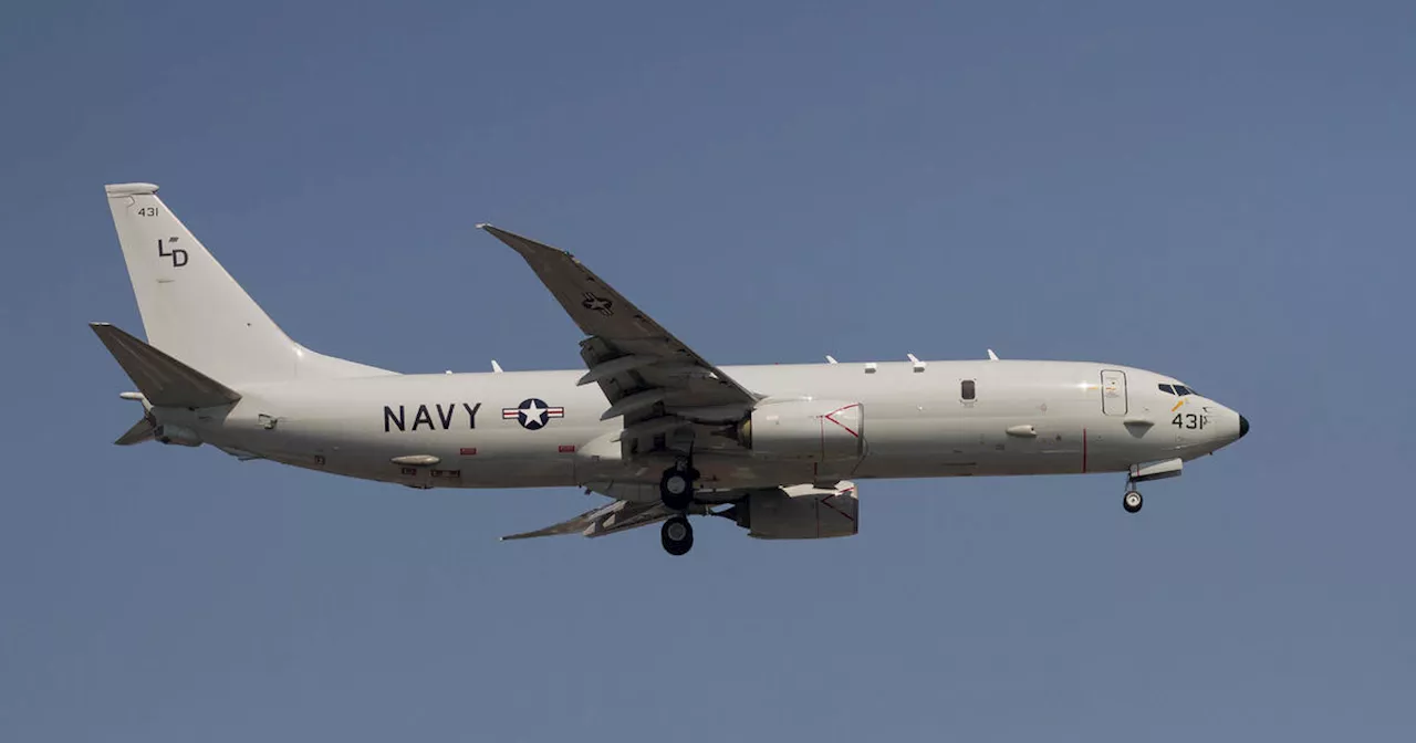 U.S. Navy aircraft shadowed by Chinese warplanes as it flies over Taiwan Strait