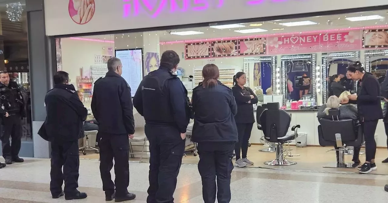 Two men arrested by immigration officers in raid on East Kilbride beauty salon