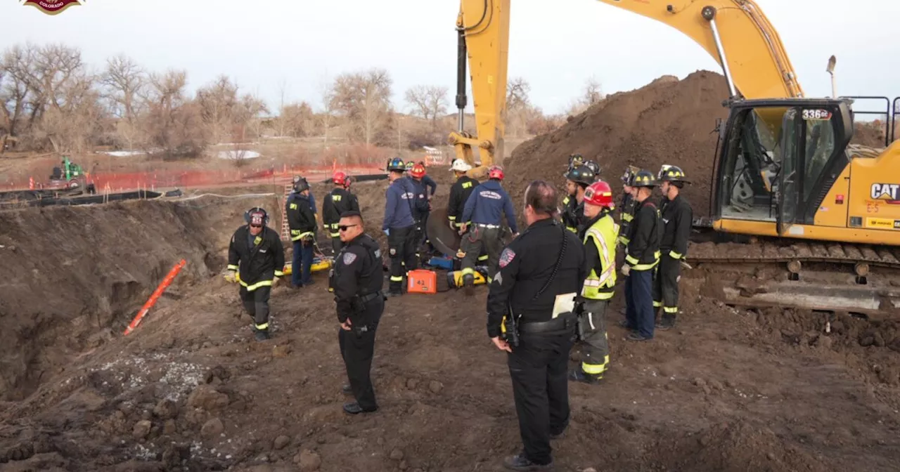 Two people rescued from trench Tuesday morning along the Cherry CreeK Trail, South Metro Fire Rescue says