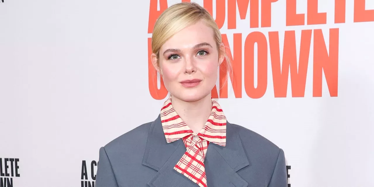 Elle Fanning Gives the Power Suit a Festive Spin With This Candy-Cane-Striped Shirt