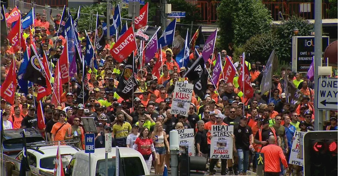 Thousands of tradies flood Brisbane CBD in protest of deal suspension