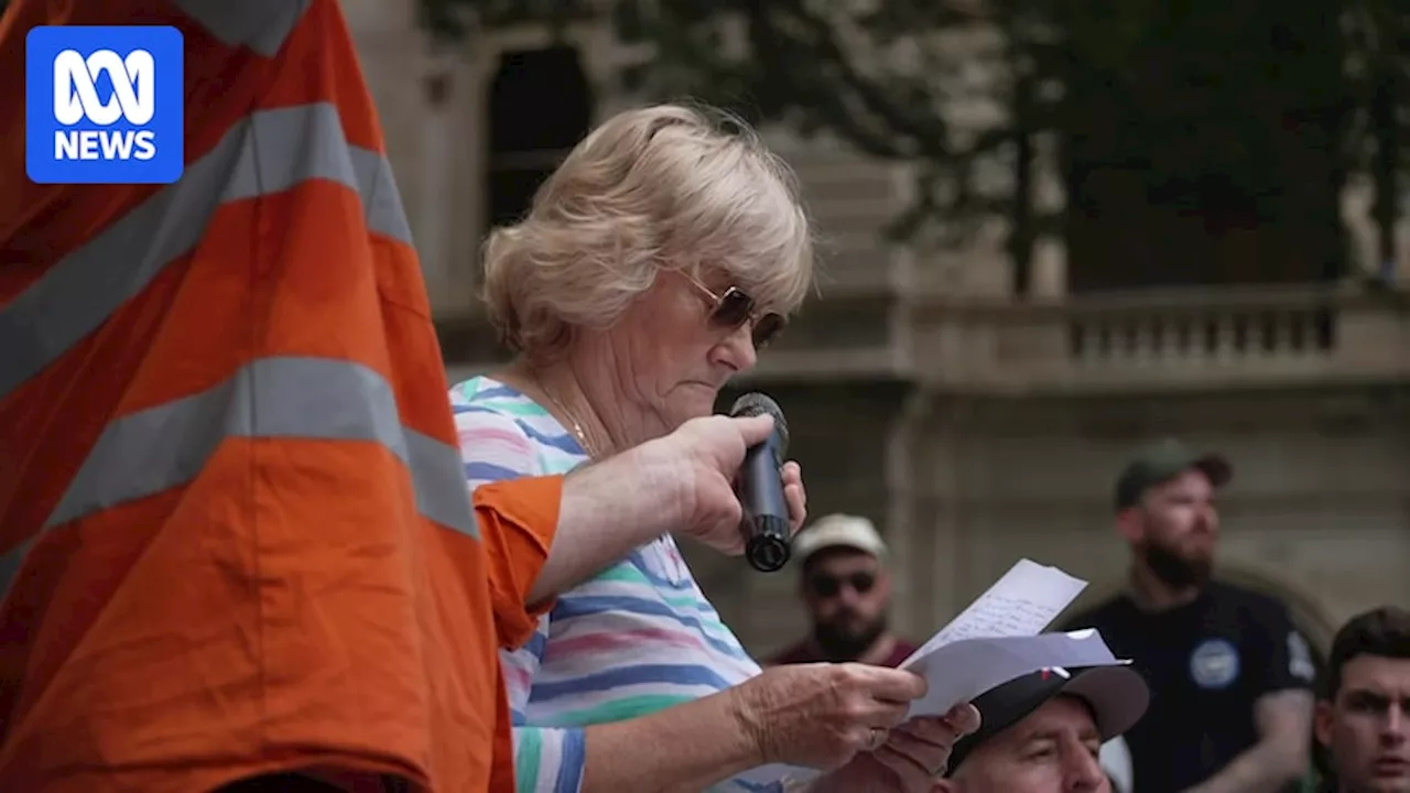 Union members protest Queensland government's suspension of conditions for construction workers