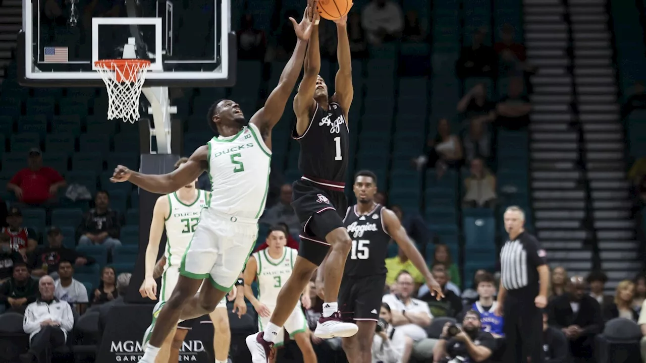 Oregon scores last 11 points to defeat No. 20 Texas A&M 80-70 in Players Era Festival