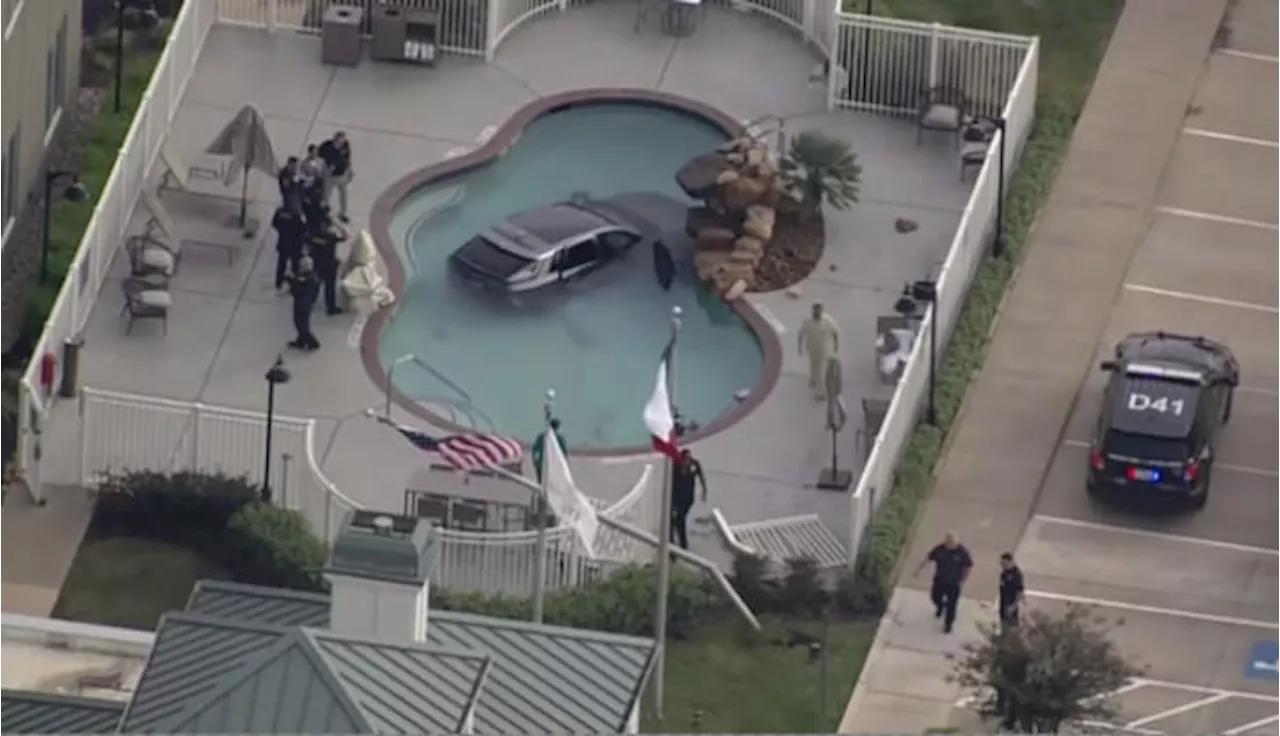 People pulled to safety after car ends up in hotel swimming pool on Houston’s west side