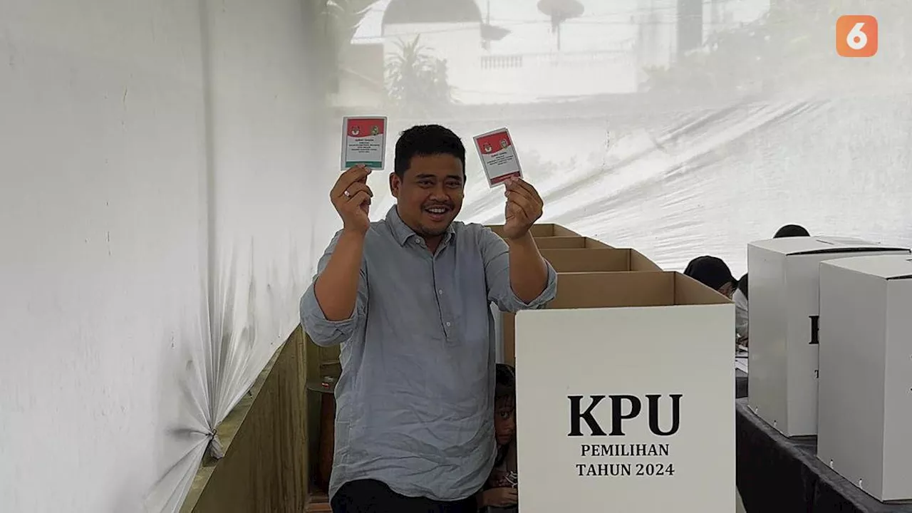 Hujan Deras, Bobby Nasution dan Kahiyang Ayu Gunakan Hak Suara Pilkada Sumut 2024