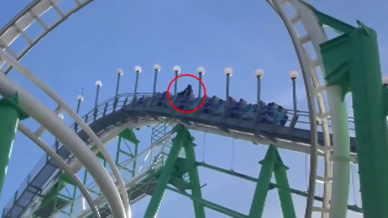 Man Escapes Moving Roller Coaster by Climbing Out