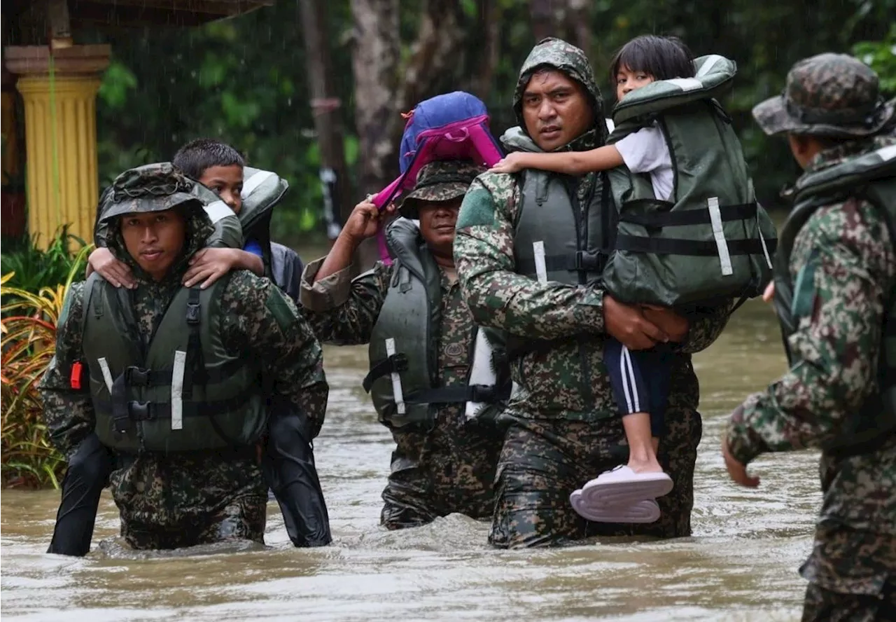 Floods claim two lives, evacuee numbers soar in Kelantan, Terengganu