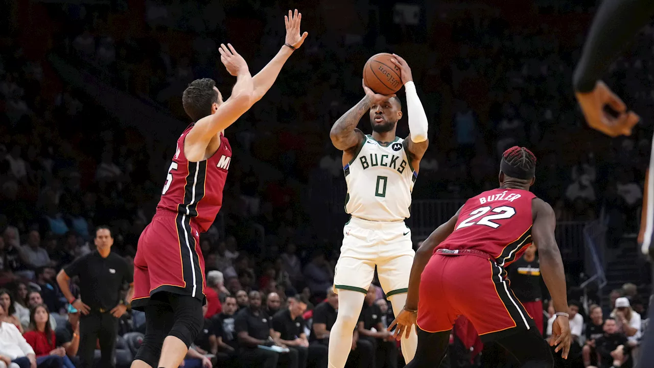 Lillard scores 37 points as short-handed Bucks hold off Heat in NBA Cup play