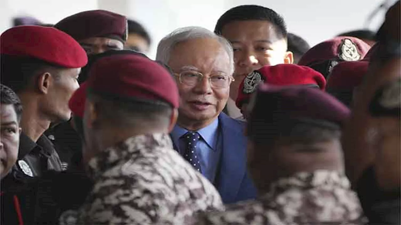 Malaysian court drops one of the graft cases against jailed former premier Najib Razak