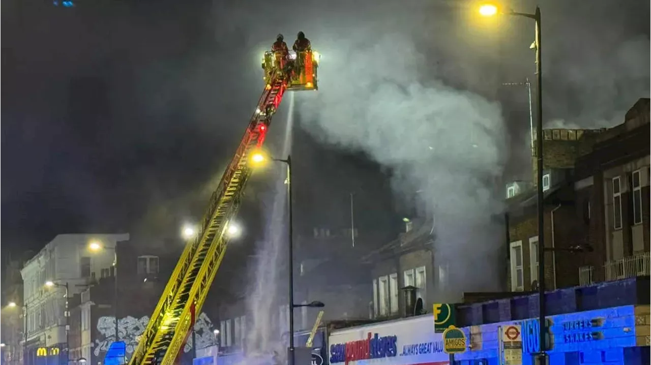 Five rushed to hospital as 100 firefighters battle blaze at north London restaurant