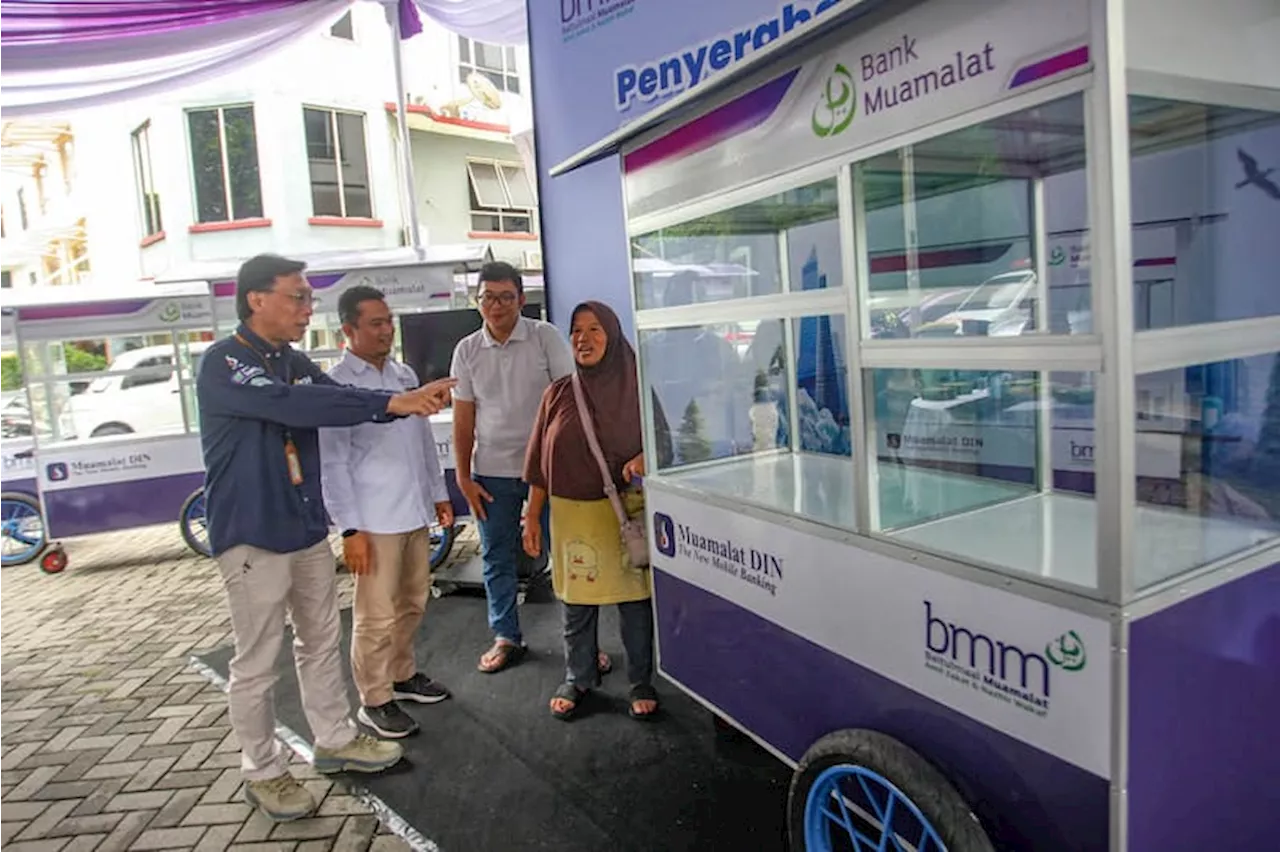 Bank Muamalat dan BMM Berikan Gerobak dan Modal Usaha kepada Pelaku UMKM