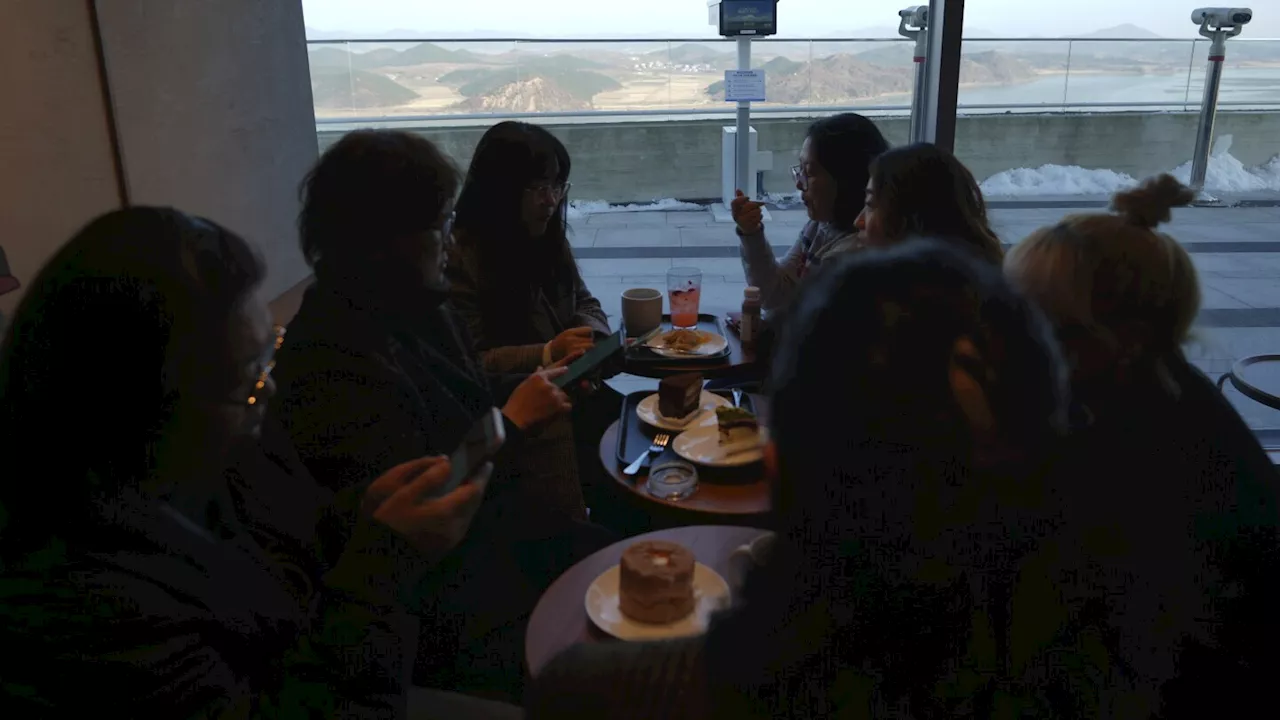 Customers at this Starbucks can sip coffee and observe a quiet North Korean mountain village