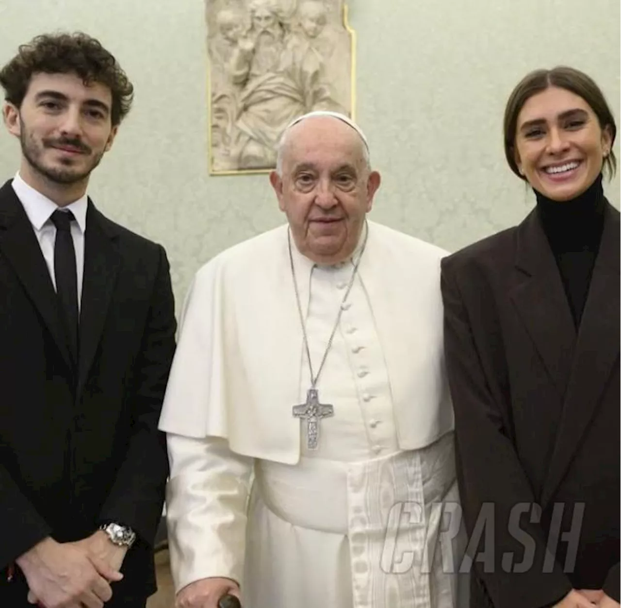 Pecco Bagnaia presents a gift on a visit to The Pope