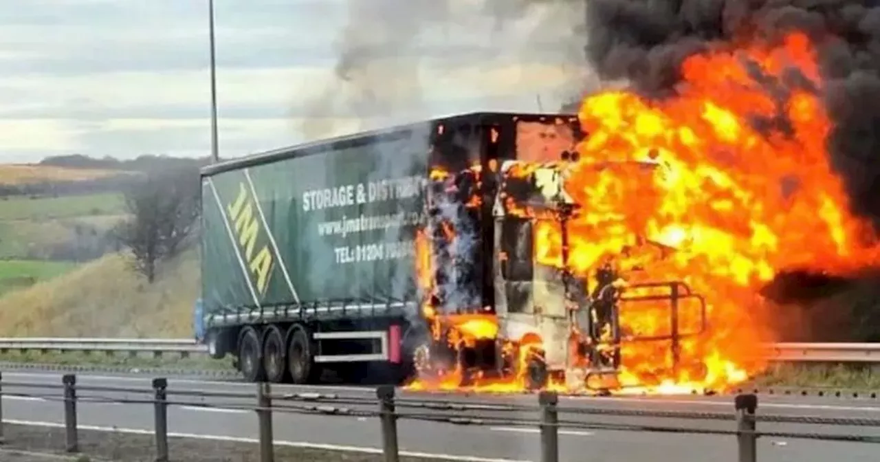 Lorry bursts into flames while carrying sawdust disrupting two major motorways