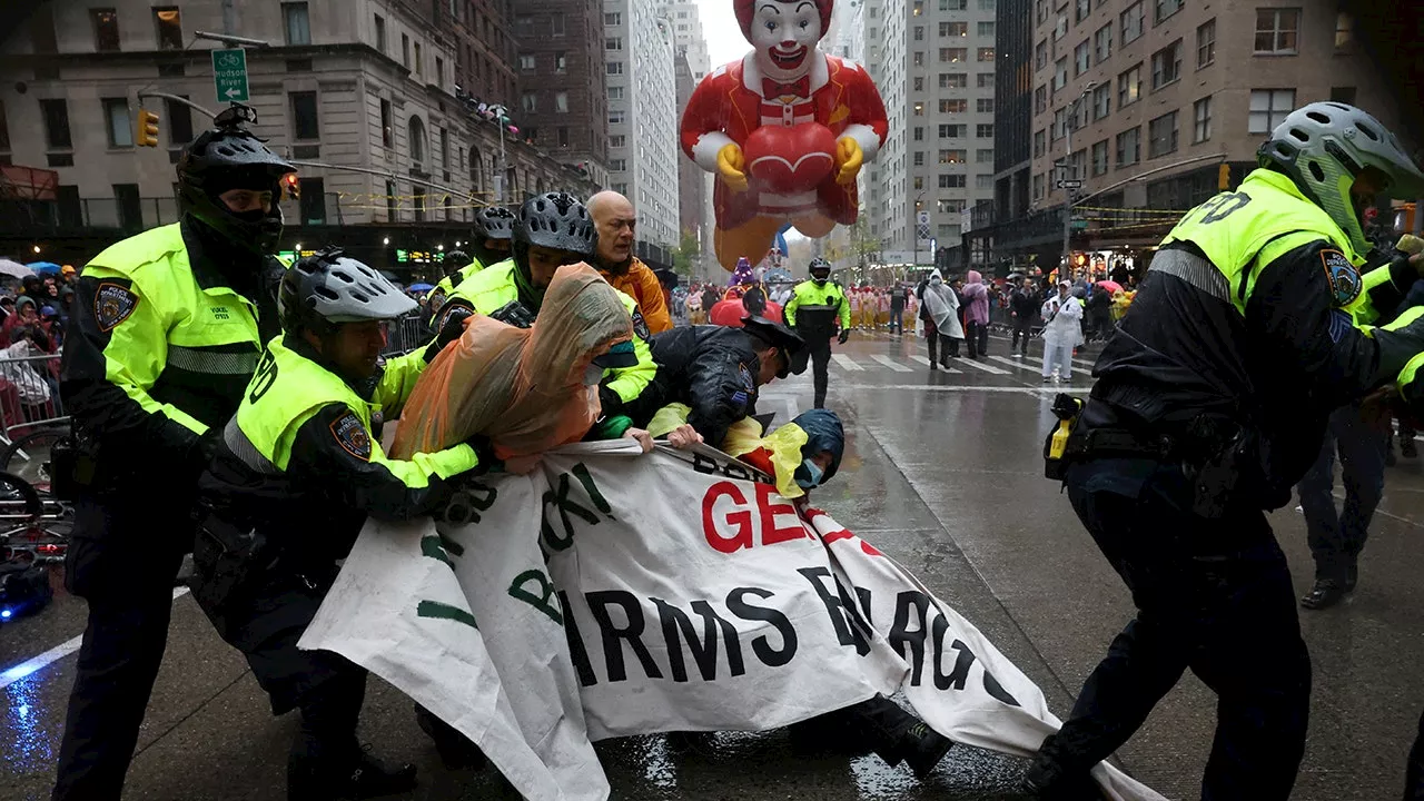 Pro-Palestine Protesters Disrupt Macy's Thanksgiving Day Parade in New York