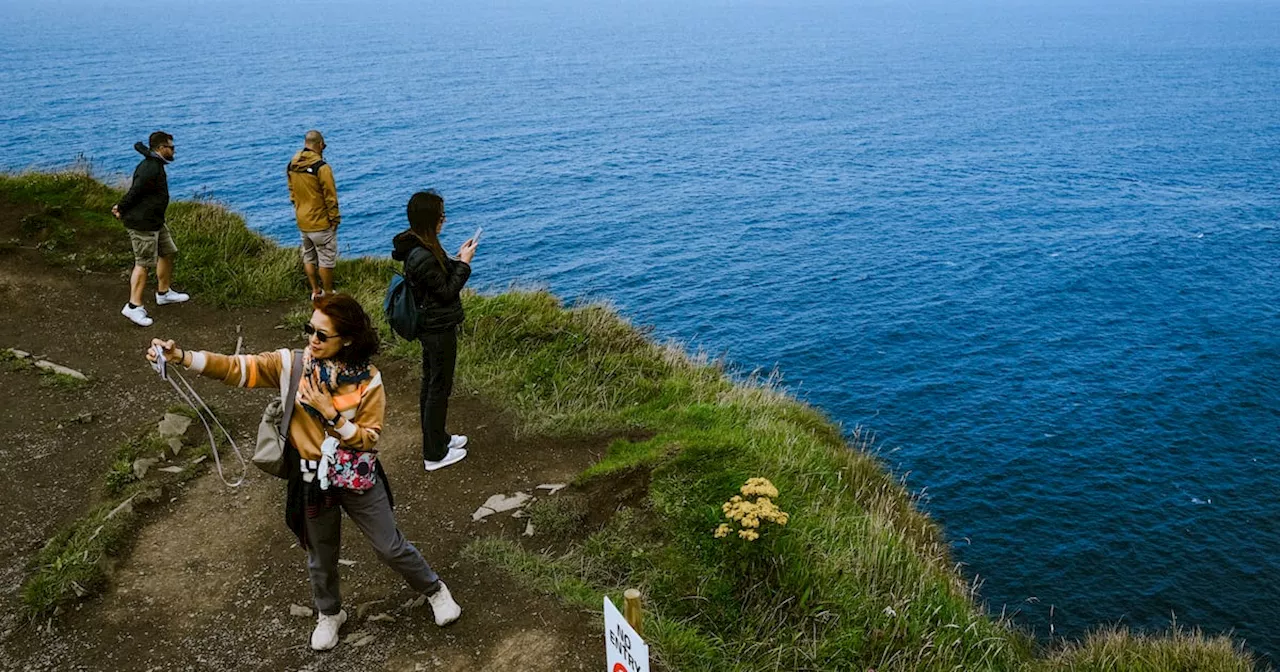 Tourists at Cliffs of Moher Amid State Visitor Decline