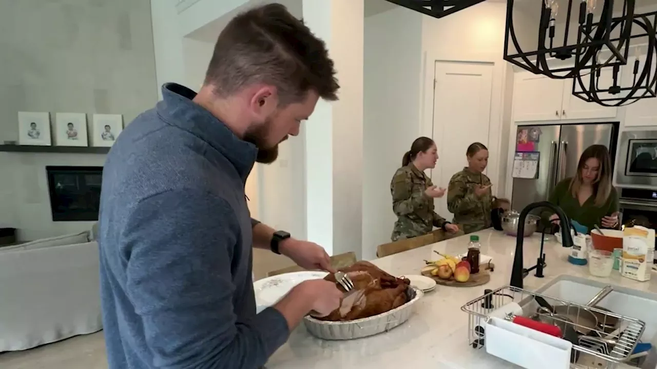 Family shares Thanksgiving with Air Force Trainees for 49th annual Operation Home Cooking