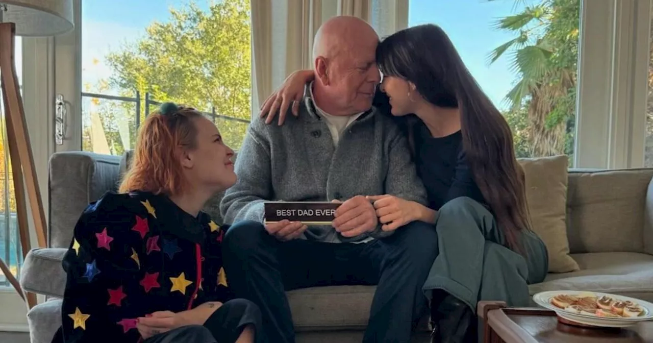 Bruce Willis shares sweet moment with daughters holding 'best dad ever' sign