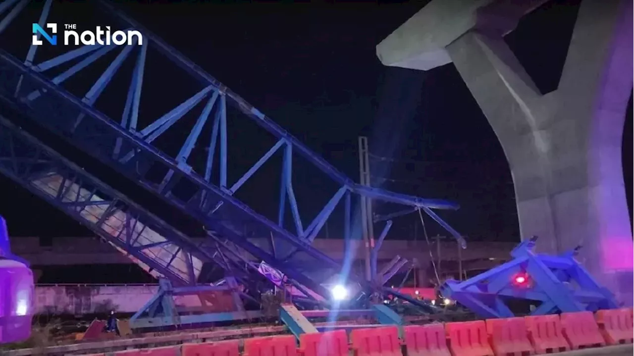 Two killed, 10 injured as construction crane carrying concrete beam collapses along Thai highway