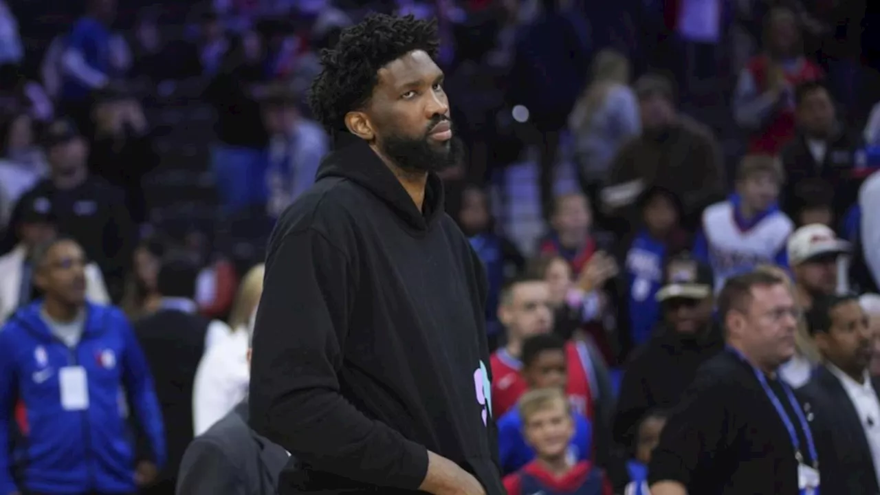 NBA superstar Joel Embiid shoves reporter Marcus Hayes in wild locker room altercation