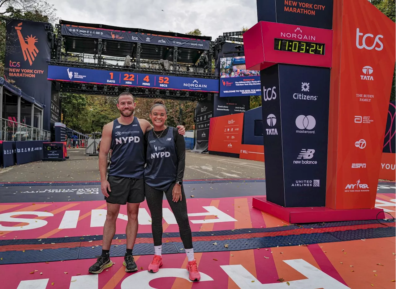  Two NYPD members running the journey for themselves and their department