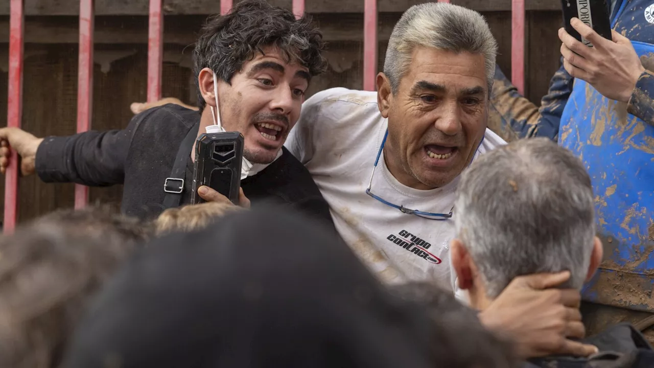 Spain’s flood survivors toss mud and shout insults at King Felipe VI