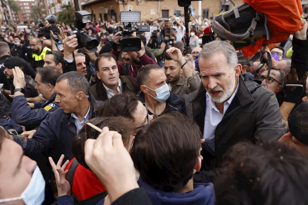 Flood survivors pelt Spain's royals with mud and premier is evacuated during a visit