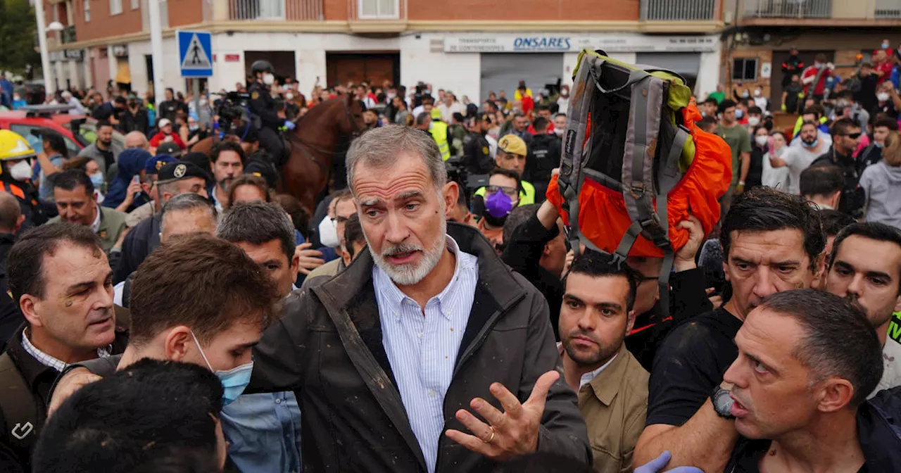 Angry crowd toss mud, insults at Spanish king visiting region devastated by floods