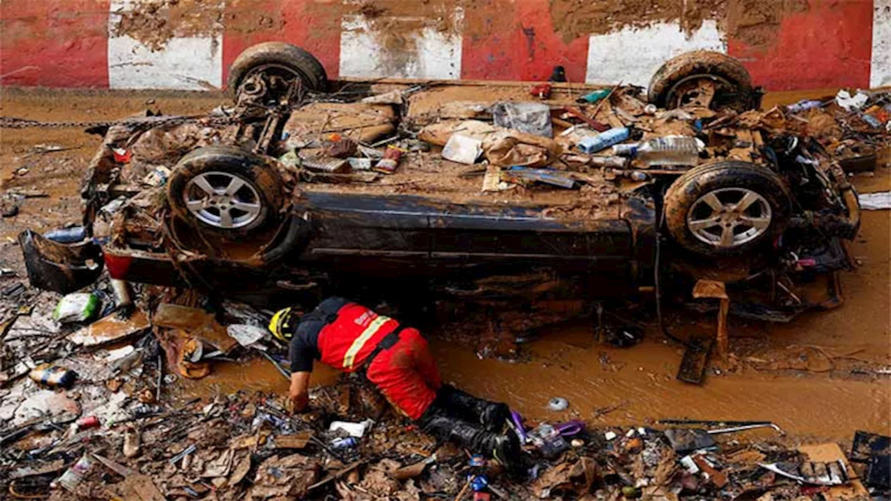 Spain mounts biggest peacetime disaster recovery operation as death toll reaches 214