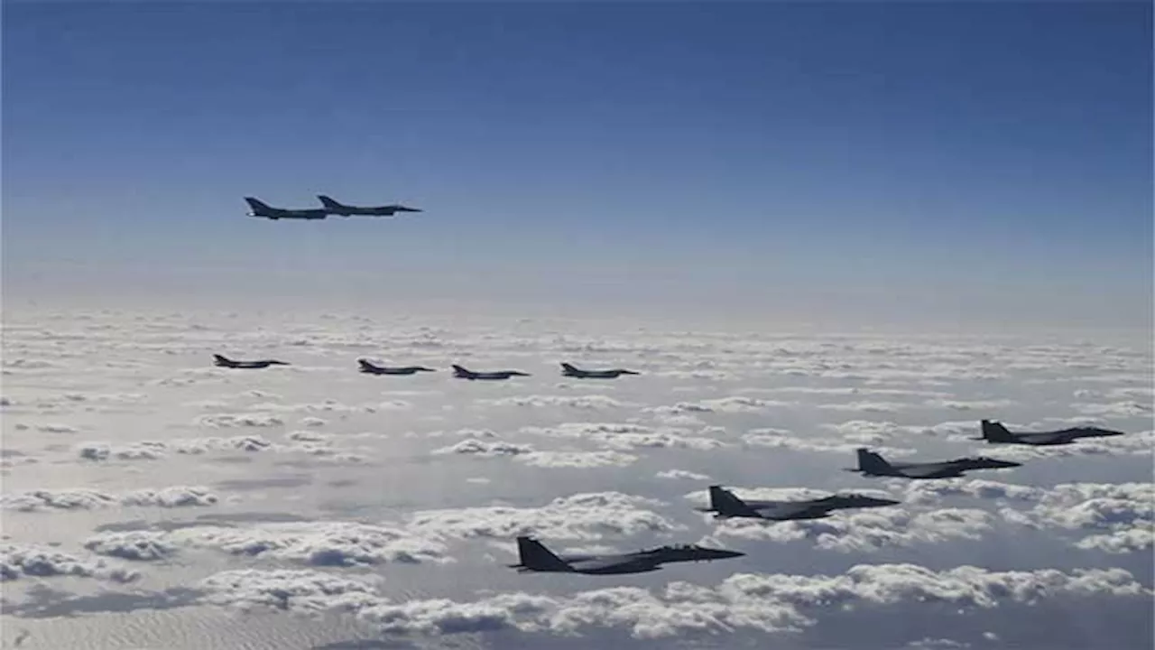 US flies long-range bomber in drill with South Korea, Japan in reaction to the North's missile test