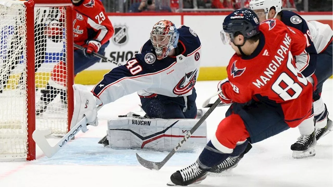 McMichael, Ovechkin power surging Capitals past Blue Jackets 7-2