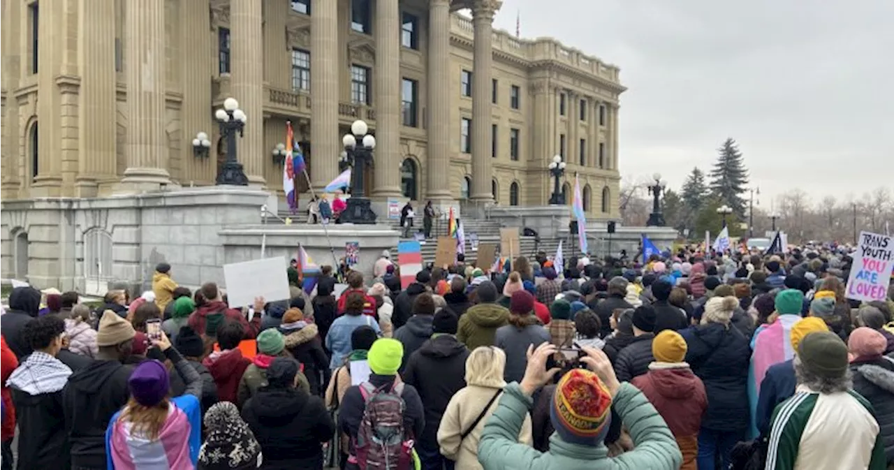 Protester rally at Alberta legislature to oppose bills affecting trans rights