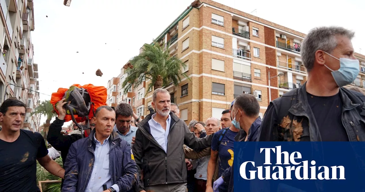 Residents throw mud and insults at Spanish king on visit to flood-hit town