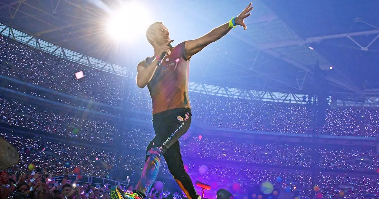 Coldplay fans gasp as Chris Martin falls through trap door in front of audience