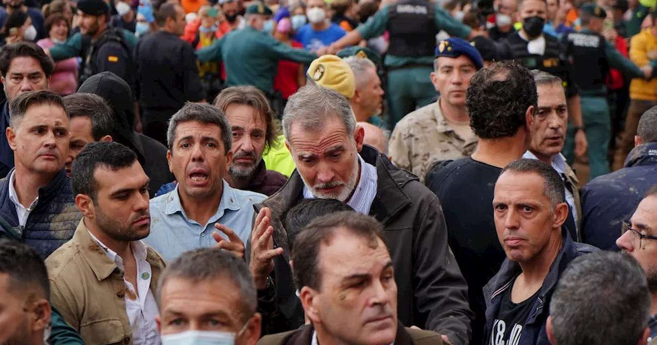 Residents throw mud and insults at Spanish king on visit to flood-hit town