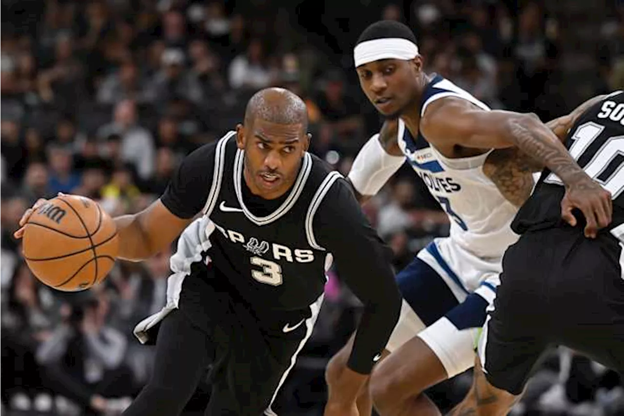 Johnson and Paul lead Spurs past Timberwolves 113-103 as Popovich misses game with illness