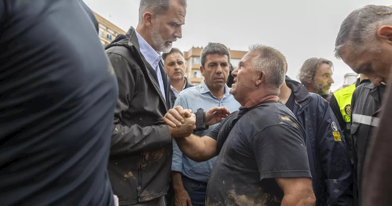 Flood survivors pelt Spain's king and queen with mud, force evacuation of premier during visit