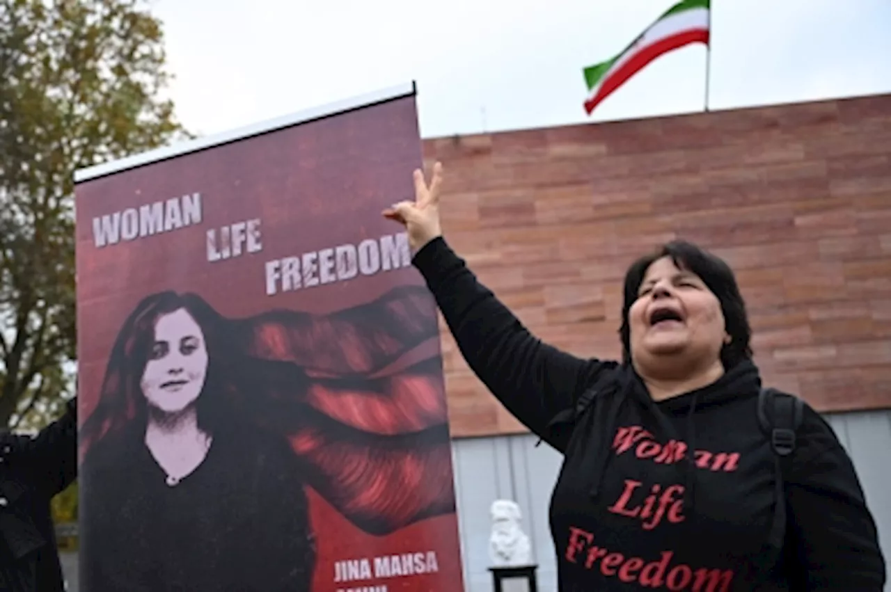 Iranian student strips down outside prestigious Tehran university in bold protest against harassment, media reports