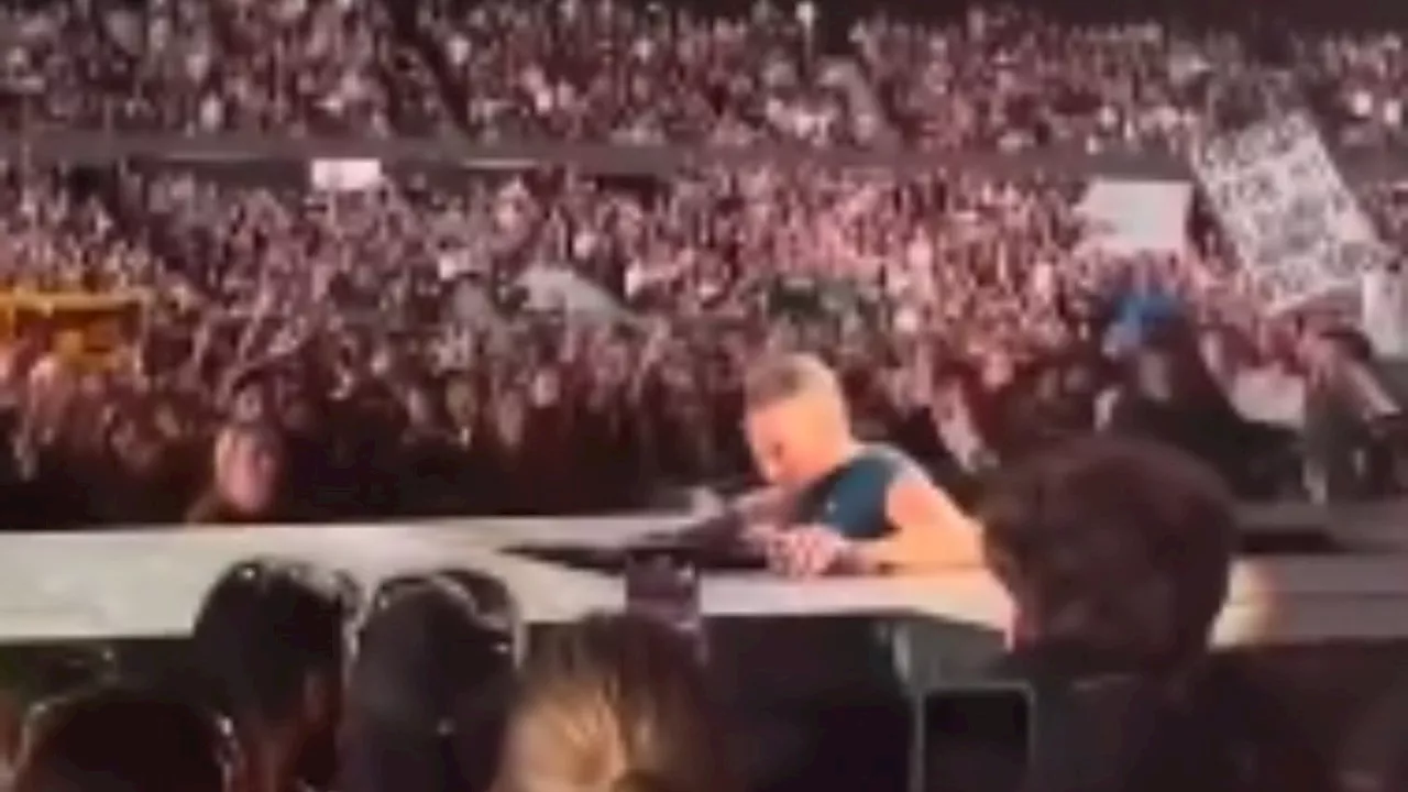 Chris Martin falls backwards through hole at Melbourne show