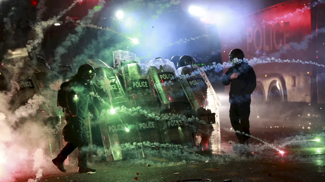 More than 100 arrested as Georgian police clash with protesters over suspension of EU talks