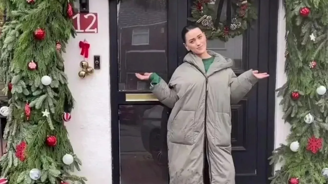 Woman Saves £700 by DIYing Her Christmas Door Arch