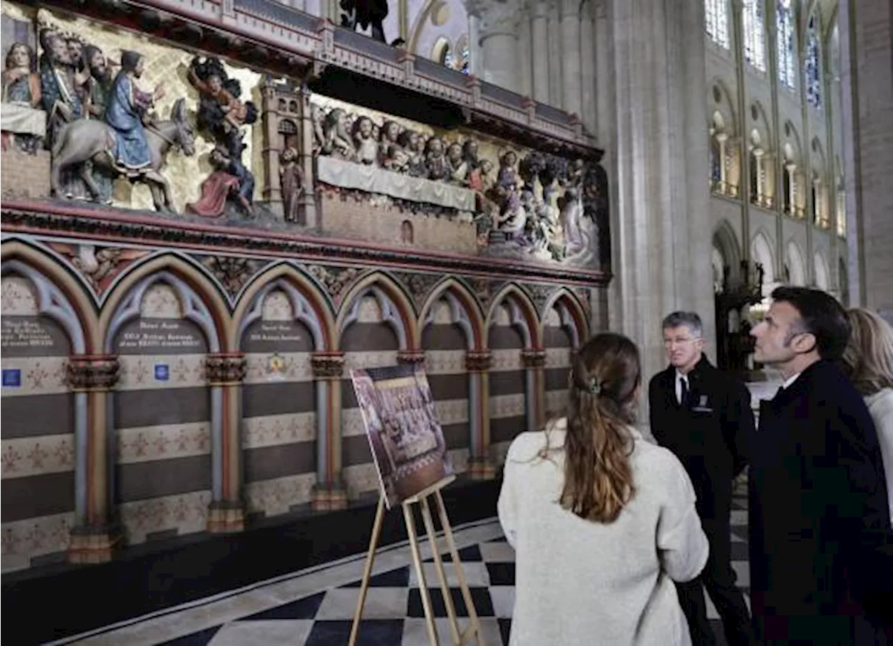 En su visita Notre Dame Macron les dice a los restauradores: ‘convirtieron el carbón en arte’