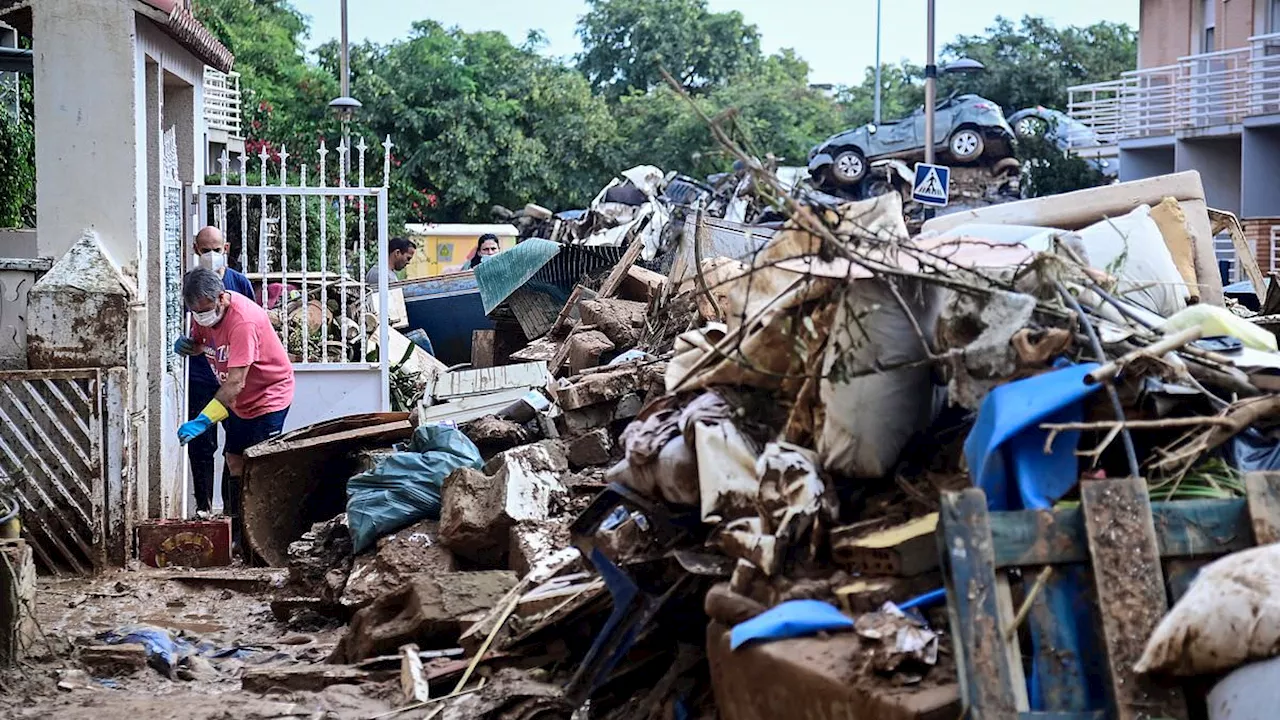 The moment deadly floods struck Valencia: How huge swells appeared from nowhere trapping people in...